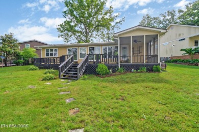 Wake up every morning to a beautiful lake view in this fully on Lake Tansi Village Country Club in Tennessee - for sale on GolfHomes.com, golf home, golf lot