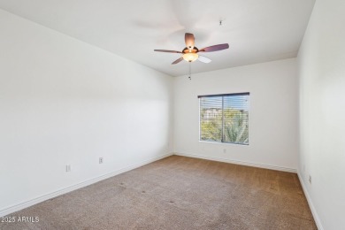 Discover luxury living in this stunning top-floor Toscana condo on Wildfire Golf Club in Arizona - for sale on GolfHomes.com, golf home, golf lot