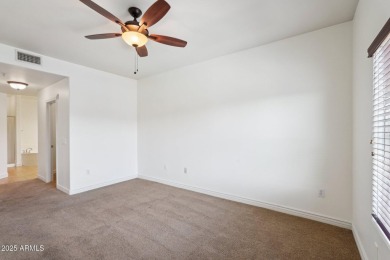 Discover luxury living in this stunning top-floor Toscana condo on Wildfire Golf Club in Arizona - for sale on GolfHomes.com, golf home, golf lot