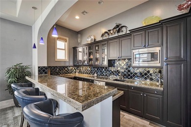 Stunning almost 8000 sq ft single-story estate in guard-gated on Rhodes Ranch Golf Club in Nevada - for sale on GolfHomes.com, golf home, golf lot