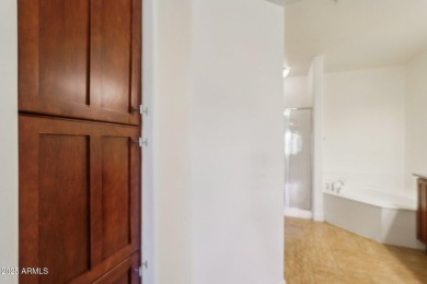 Discover luxury living in this stunning top-floor Toscana condo on Wildfire Golf Club in Arizona - for sale on GolfHomes.com, golf home, golf lot