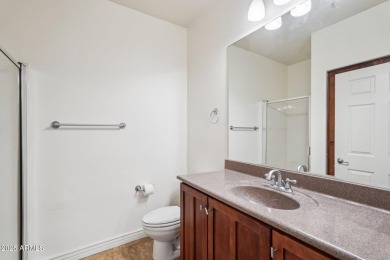 Discover luxury living in this stunning top-floor Toscana condo on Wildfire Golf Club in Arizona - for sale on GolfHomes.com, golf home, golf lot