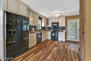 Wake up every morning to a beautiful lake view in this fully on Lake Tansi Village Country Club in Tennessee - for sale on GolfHomes.com, golf home, golf lot