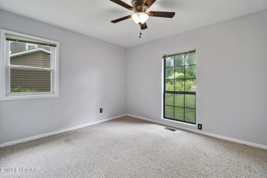 Wake up every morning to a beautiful lake view in this fully on Lake Tansi Village Country Club in Tennessee - for sale on GolfHomes.com, golf home, golf lot