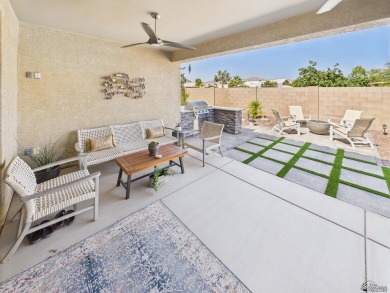 immaculate 2023 Elliott Home in Estrella at Mesa del Sol - on Mesa Del Sol Golf Club in Arizona - for sale on GolfHomes.com, golf home, golf lot