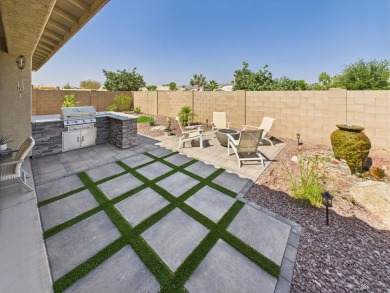 immaculate 2023 Elliott Home in Estrella at Mesa del Sol - on Mesa Del Sol Golf Club in Arizona - for sale on GolfHomes.com, golf home, golf lot
