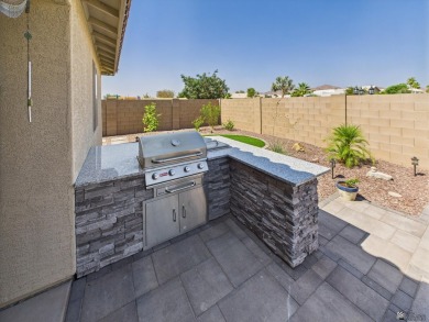 immaculate 2023 Elliott Home in Estrella at Mesa del Sol - on Mesa Del Sol Golf Club in Arizona - for sale on GolfHomes.com, golf home, golf lot