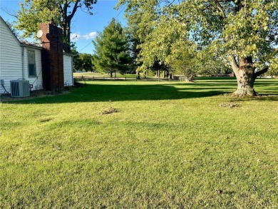 If you are looking for a great building spot with utilities on on Roland Barkau Memorial Golf Course in Illinois - for sale on GolfHomes.com, golf home, golf lot