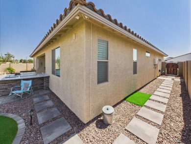 immaculate 2023 Elliott Home in Estrella at Mesa del Sol - on Mesa Del Sol Golf Club in Arizona - for sale on GolfHomes.com, golf home, golf lot