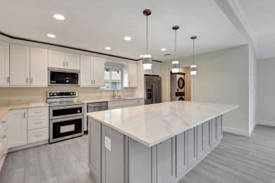 Wait until you see this newly remodeled villa in prestigious on Delray Dunes Golf and Country Club in Florida - for sale on GolfHomes.com, golf home, golf lot