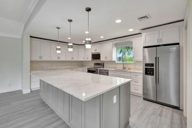 Wait until you see this newly remodeled villa in prestigious on Delray Dunes Golf and Country Club in Florida - for sale on GolfHomes.com, golf home, golf lot