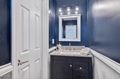 Perched high above Lake Mohawk on coveted Birch Parkway, this on Lake Mohawk Golf Club in New Jersey - for sale on GolfHomes.com, golf home, golf lot