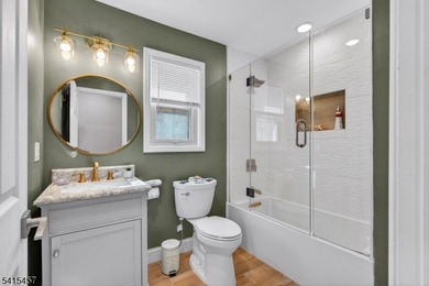 Perched high above Lake Mohawk on coveted Birch Parkway, this on Lake Mohawk Golf Club in New Jersey - for sale on GolfHomes.com, golf home, golf lot