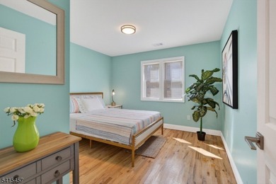 Perched high above Lake Mohawk on coveted Birch Parkway, this on Lake Mohawk Golf Club in New Jersey - for sale on GolfHomes.com, golf home, golf lot