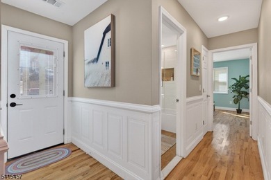 Perched high above Lake Mohawk on coveted Birch Parkway, this on Lake Mohawk Golf Club in New Jersey - for sale on GolfHomes.com, golf home, golf lot