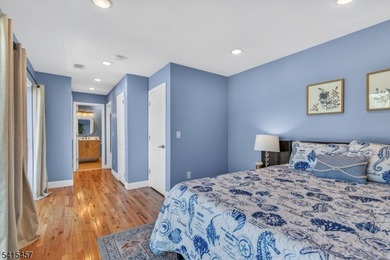 Perched high above Lake Mohawk on coveted Birch Parkway, this on Lake Mohawk Golf Club in New Jersey - for sale on GolfHomes.com, golf home, golf lot