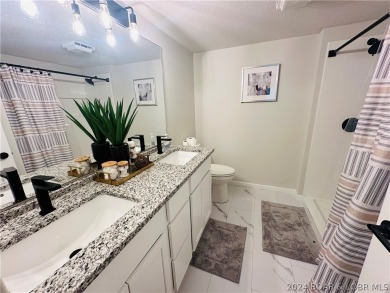 Welcome to your new lakefront getaway at Bristol Bay Condos! on Seasons Ridge At Four Seasons in Missouri - for sale on GolfHomes.com, golf home, golf lot