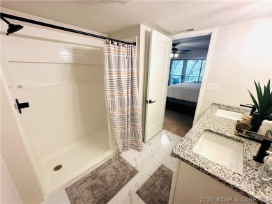 Welcome to your new lakefront getaway at Bristol Bay Condos! on Seasons Ridge At Four Seasons in Missouri - for sale on GolfHomes.com, golf home, golf lot