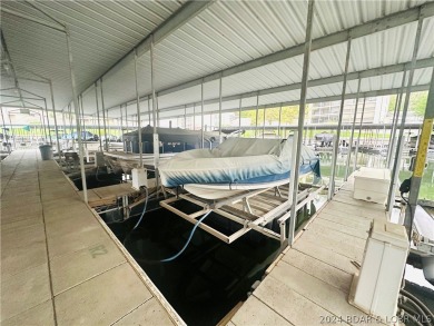 Welcome to your new lakefront getaway at Bristol Bay Condos! on Seasons Ridge At Four Seasons in Missouri - for sale on GolfHomes.com, golf home, golf lot