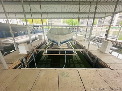 Welcome to your new lakefront getaway at Bristol Bay Condos! on Seasons Ridge At Four Seasons in Missouri - for sale on GolfHomes.com, golf home, golf lot
