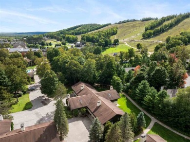 Experience the ultimate mountain retreat at this impeccably on Boyne Mountain Resort - Alpine in Michigan - for sale on GolfHomes.com, golf home, golf lot