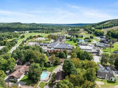 Experience the ultimate mountain retreat at this impeccably on Boyne Mountain Resort - Alpine in Michigan - for sale on GolfHomes.com, golf home, golf lot
