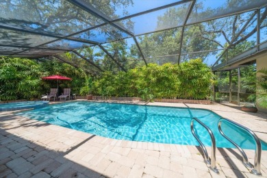Nestled in the heart of desirable Dunedin on a quiet cul-de-sac on The Dunedin Country Club in Florida - for sale on GolfHomes.com, golf home, golf lot