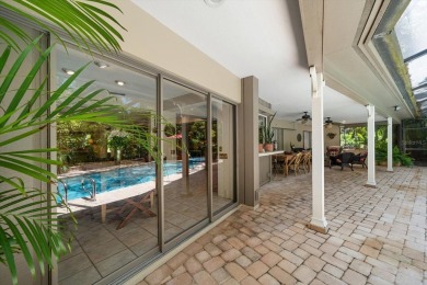 Nestled in the heart of desirable Dunedin on a quiet cul-de-sac on The Dunedin Country Club in Florida - for sale on GolfHomes.com, golf home, golf lot