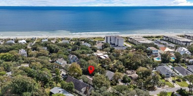 Chic beach retreat: modern style meets coastal charm! Located on Whispering Pines in South Carolina - for sale on GolfHomes.com, golf home, golf lot