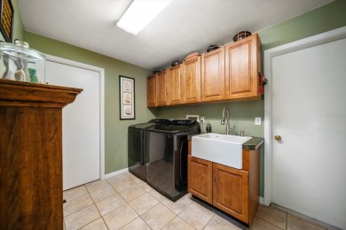 Nestled in the heart of desirable Dunedin on a quiet cul-de-sac on The Dunedin Country Club in Florida - for sale on GolfHomes.com, golf home, golf lot