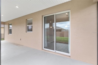 Welcome to this stunning 2-bedroom, 2-bathroom plus flex room on Trilogy at Ocala Preserve in Florida - for sale on GolfHomes.com, golf home, golf lot