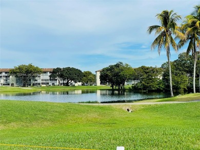 OVERLOOKS GOLF COURSE AND LAKE. FULL SERVICE, RESORT-STYLE on Flamingo Lakes Country Club in Florida - for sale on GolfHomes.com, golf home, golf lot