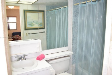 FIRST FLOOR CORNER unit within walking distance to the main on Sunrise Lakes Phase III in Florida - for sale on GolfHomes.com, golf home, golf lot