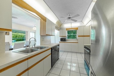 Super Large Waterfront Lot with Wide Canal Views! Enjoy fishing on Leisureville Community Golf Course in Florida - for sale on GolfHomes.com, golf home, golf lot