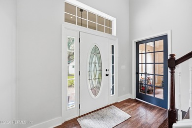 Imagine ending your day on the covered lanai, grilling in the on St. Johns Golf and Country Club in Florida - for sale on GolfHomes.com, golf home, golf lot