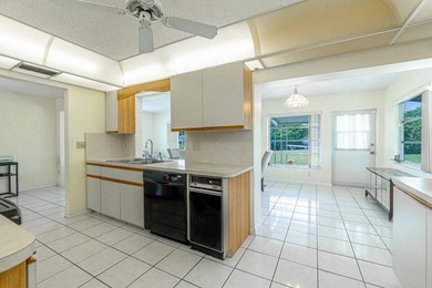 Super Large Waterfront Lot with Wide Canal Views! Enjoy fishing on Leisureville Community Golf Course in Florida - for sale on GolfHomes.com, golf home, golf lot