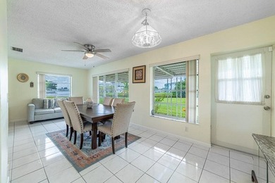 Super Large Waterfront Lot with Wide Canal Views! Enjoy fishing on Leisureville Community Golf Course in Florida - for sale on GolfHomes.com, golf home, golf lot