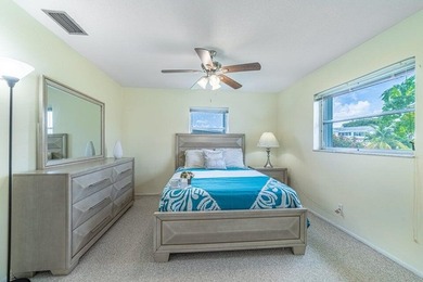 Super Large Waterfront Lot with Wide Canal Views! Enjoy fishing on Leisureville Community Golf Course in Florida - for sale on GolfHomes.com, golf home, golf lot