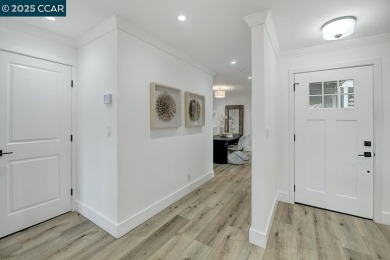 This beautifully remodeled lower-level condominium offers on Rossmoor Golf Course in California - for sale on GolfHomes.com, golf home, golf lot