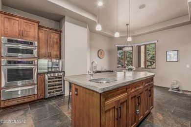 Discover refined desert living in this remodeled 3,891 sq. ft on The Lodge at Ventana Canyon - Canyon  in Arizona - for sale on GolfHomes.com, golf home, golf lot