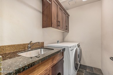 Discover refined desert living in this remodeled 3,891 sq. ft on The Lodge at Ventana Canyon - Canyon  in Arizona - for sale on GolfHomes.com, golf home, golf lot