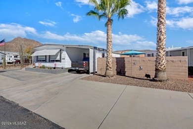 Beautiful home with updates galore! Larger kitchen with Corian on Tucson Estates Golf Course in Arizona - for sale on GolfHomes.com, golf home, golf lot