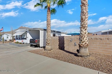 Beautiful home with updates galore! Larger kitchen with Corian on Tucson Estates Golf Course in Arizona - for sale on GolfHomes.com, golf home, golf lot