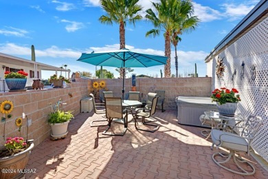 Beautiful home with updates galore! Larger kitchen with Corian on Tucson Estates Golf Course in Arizona - for sale on GolfHomes.com, golf home, golf lot