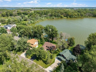 Spacious, scenic, and serene, this 4-bedroom, 3-bath lake house on Chomonix Golf Course in Minnesota - for sale on GolfHomes.com, golf home, golf lot