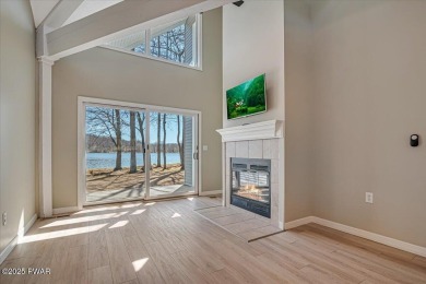 Unbeatable location nestled directly between the tranquil shores on Paupack Hills Golf and Country Club in Pennsylvania - for sale on GolfHomes.com, golf home, golf lot