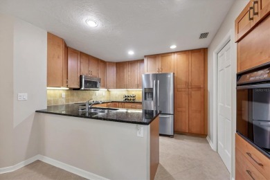 This elegant end-unit villa in the desirable Villa Palmeras on TPC Prestancia in Florida - for sale on GolfHomes.com, golf home, golf lot