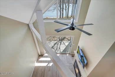 Unbeatable location nestled directly between the tranquil shores on Paupack Hills Golf and Country Club in Pennsylvania - for sale on GolfHomes.com, golf home, golf lot