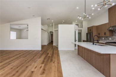 Prepare to be wowed by the freshly remodeled residence awaiting on Desert Lakes Golf Course in Arizona - for sale on GolfHomes.com, golf home, golf lot