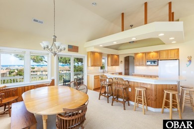 Coastal elegance meets timeless craftsmanship in Kitty Hawk, NC! on Seascape Golf Links in North Carolina - for sale on GolfHomes.com, golf home, golf lot